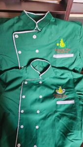 Two embroidered jackets with “Chicking Plus – Taste, Brew & Play!” branding.