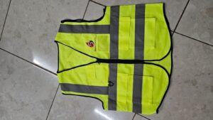 -High‑visibility yellow safety vest with reflective stripes, multiple pockets, and Baystar Energies logo on upper left chest.