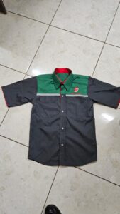 Dark gray and green short‑sleeved work shirt with red inner collar, chest pockets, and embroidered Baystar Energies logo.